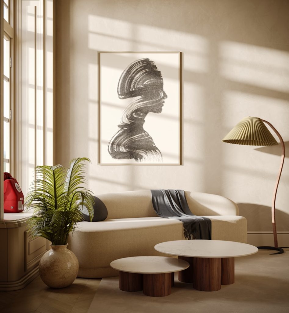 a living room filled with furniture and a painting on the wall